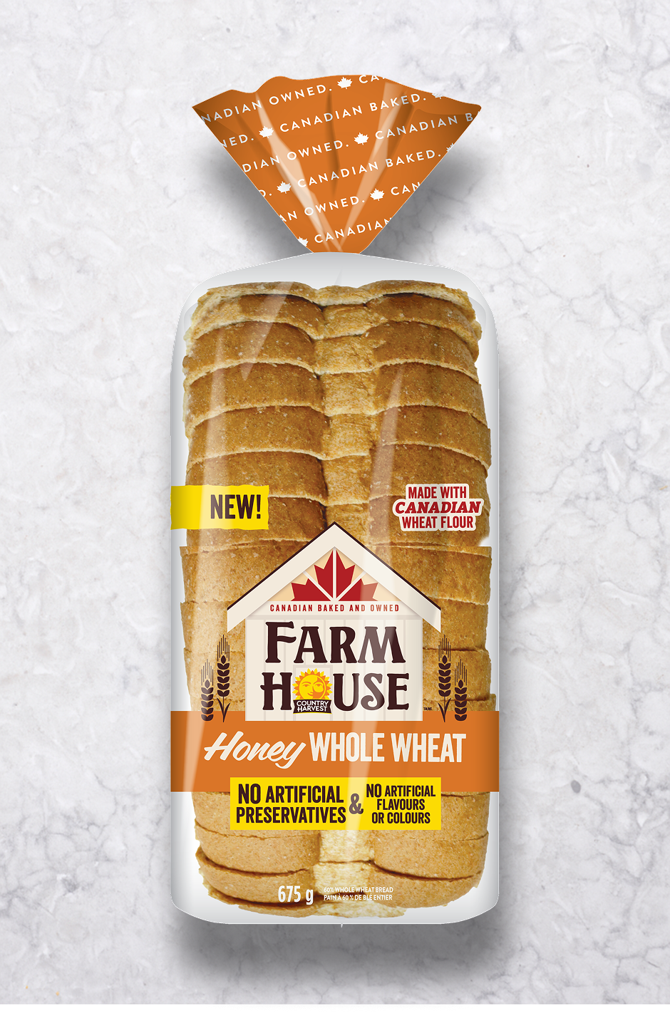 Farmhouse Honey Whole Wheat bread packaging on a grey background